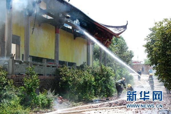 代寺人口_浙江省金华法明寺起火 35尊玉佛遭严重损毁(2)